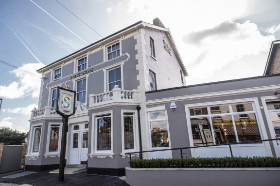 A victorian Pub with grey walls